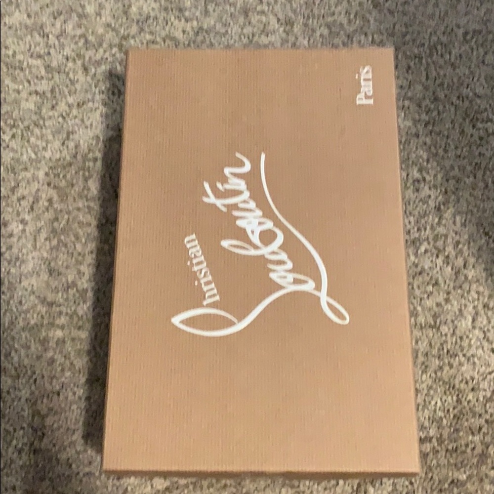 Christian Louboutin’s.  Size 40